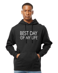 Thumbnail for dark skinned person wearing black pullover hoodie with best day of my life written in white and a cross in the O