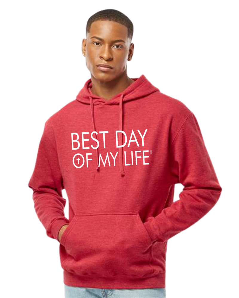 dark skinned person red pullover hoodie with best day of my life written in white and a cross in the O