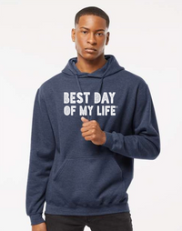 Thumbnail for dark-skinned person with short hair wearing a blue pullover hoodie with best day of my life written in white block lettering