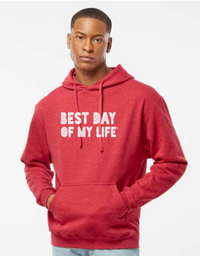 Thumbnail for dark-skinned person with short hair wearing a red pullover hoodie with best day of my life written in white block lettering