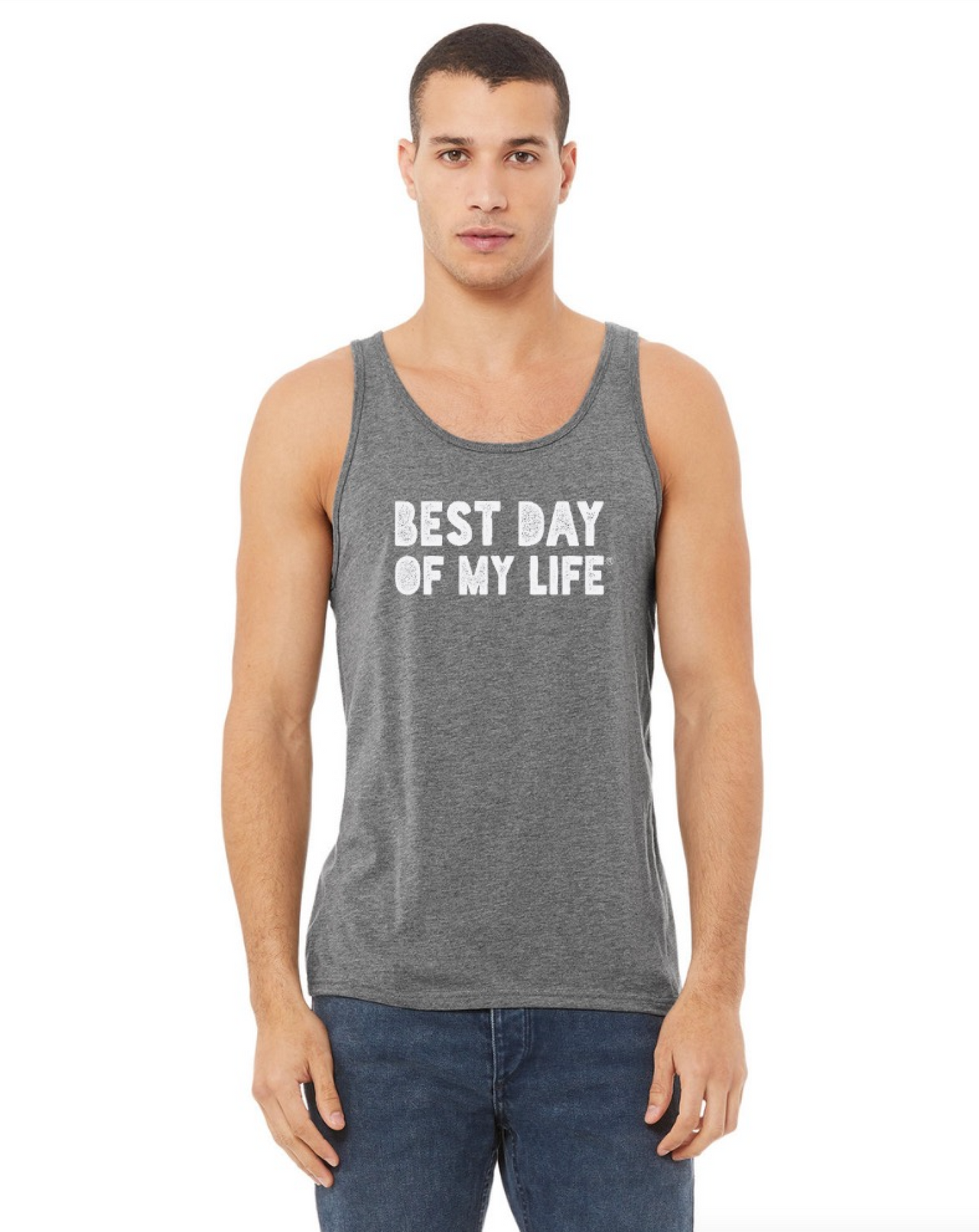 medium-skinner person with short hair wearing a grey tank top with best day of my life written in white block lettering